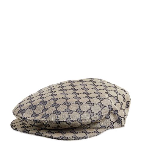 gg canvas hat with gucci strip on beak|Original GG canvas flat cap .